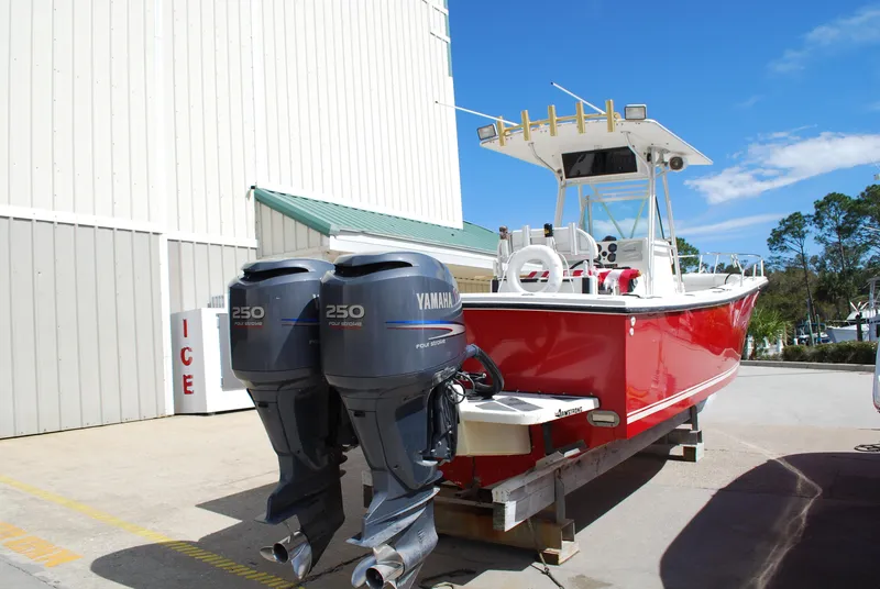 Slide: The Image of 1996 Regulator 26 Classic boat with twin Yamaha 250 engines. - 11