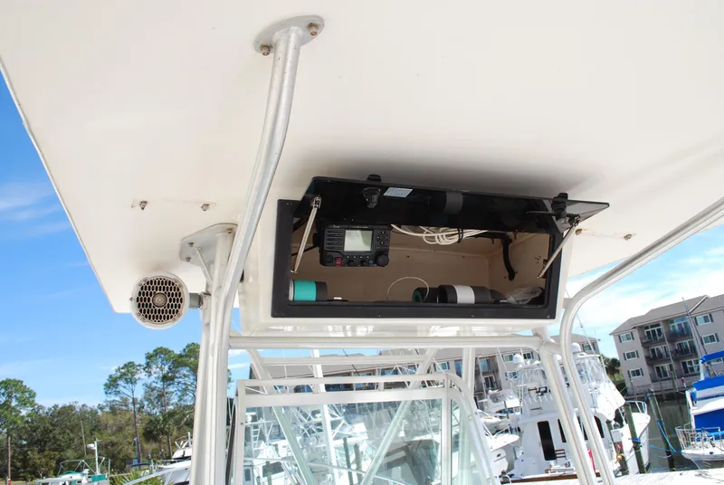 Slide: The Image of 1996 Regulator 26 Classic boat electronics compartment with open panel. - 20