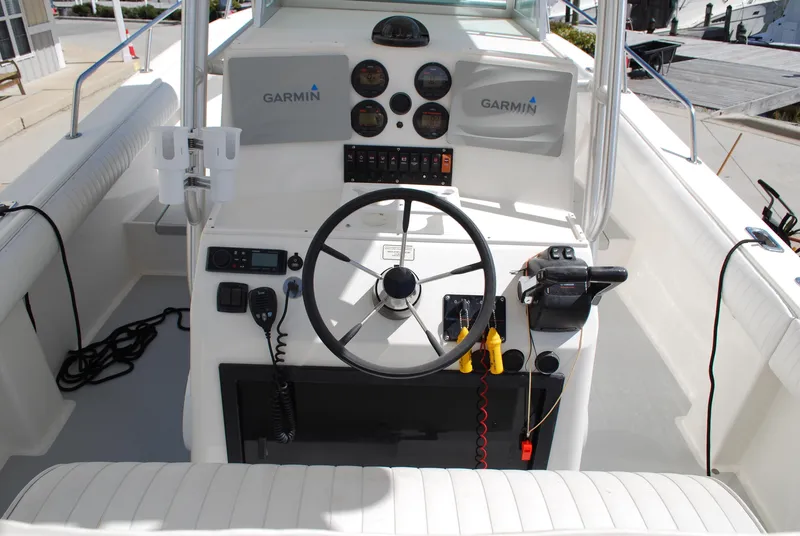 Slide: The Image of 1996 Regulator 26 Classic boat cockpit with Garmin navigation system. - 4