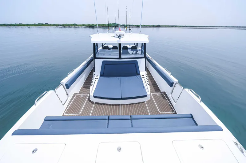 Slide: The Image of Custom SilverCAT 40CC 2025 boat with sleek design and spacious deck on calm water. - 19