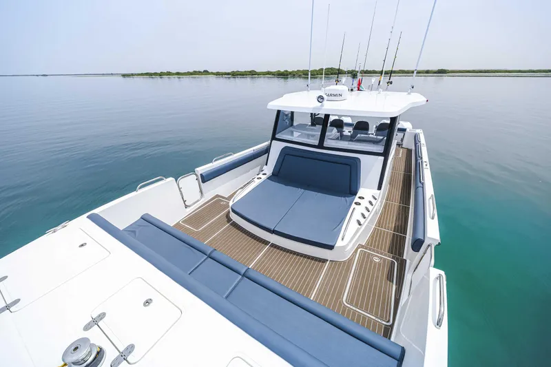 Slide: The Image of 2025 Custom SilverCAT 40CC boat with sleek design on calm water. - 20