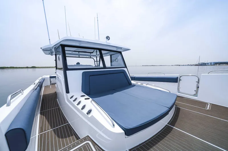 Slide: The Image of Custom SilverCAT 40CC 2025 boat with sleek design and spacious deck on calm water. - 21