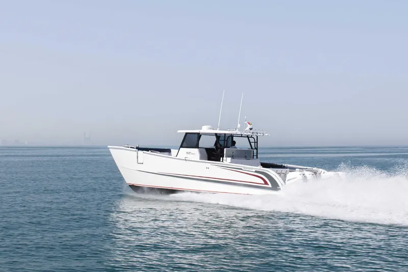 Slide: The Image of Custom SilverCAT 40CC boat cruising on open water, 2025 model. - 26