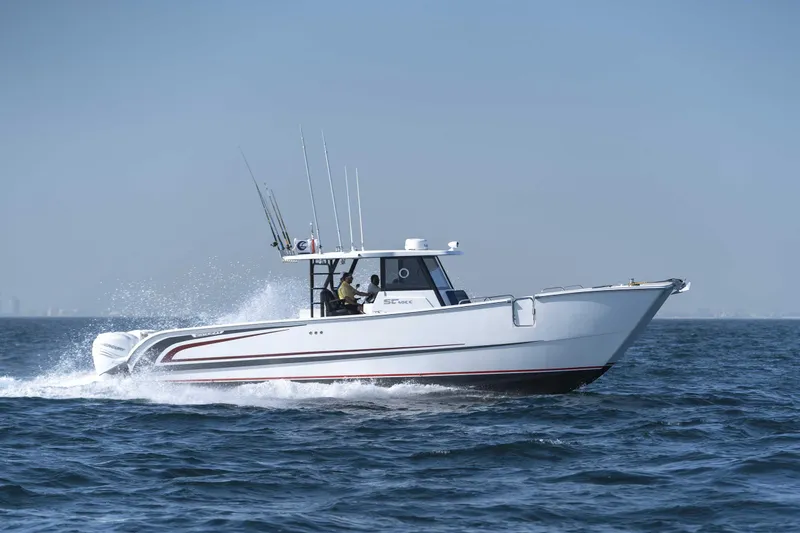 Slide: The Image of Custom SilverCAT 40CC boat cruising on open water, 2025 model. - 30