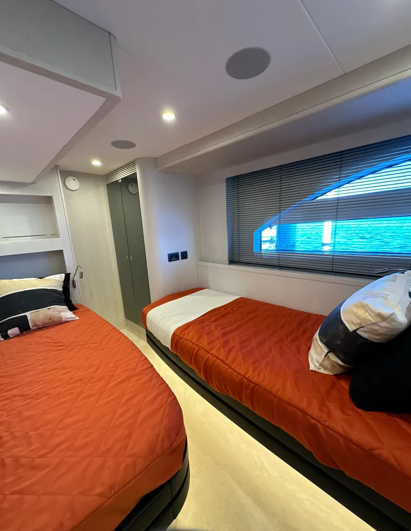 Slide: The Image of Luxurious cabin interior of 2019 Van der Valk BeachClub 600 yacht with twin beds. - 10