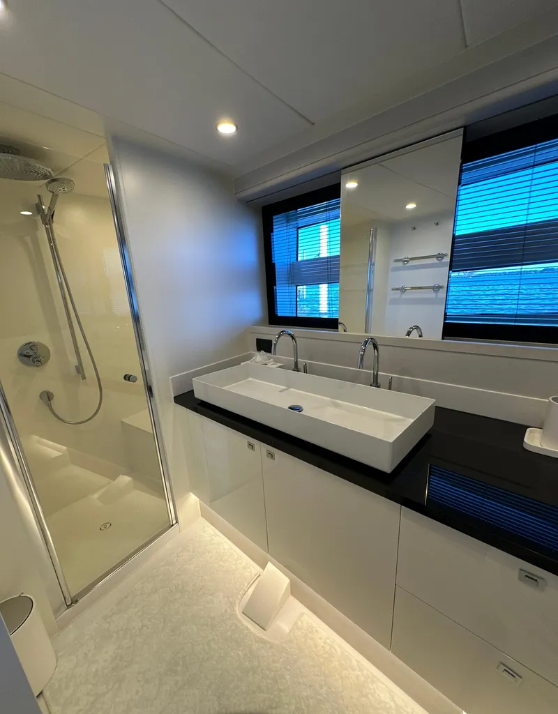 Slide: The Image of Luxurious bathroom in 2019 Van der Valk BeachClub 600 yacht with modern fixtures and shower. - 11