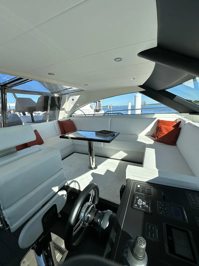 Slide: The Image of Luxurious 2019 Van der Valk BeachClub 600 yacht interior with modern seating and helm. - 19