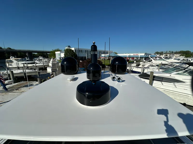 Slide: The Image of Van der Valk BeachClub 600 yacht deck with navigation equipment, docked at a marina, 2019 model. - 34