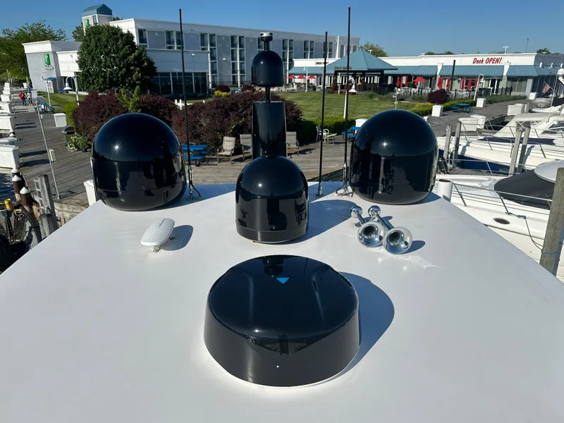 Slide: The Image of Rooftop equipment on 2019 Van der Valk BeachClub 600 yacht, featuring antennas and domes. - 35
