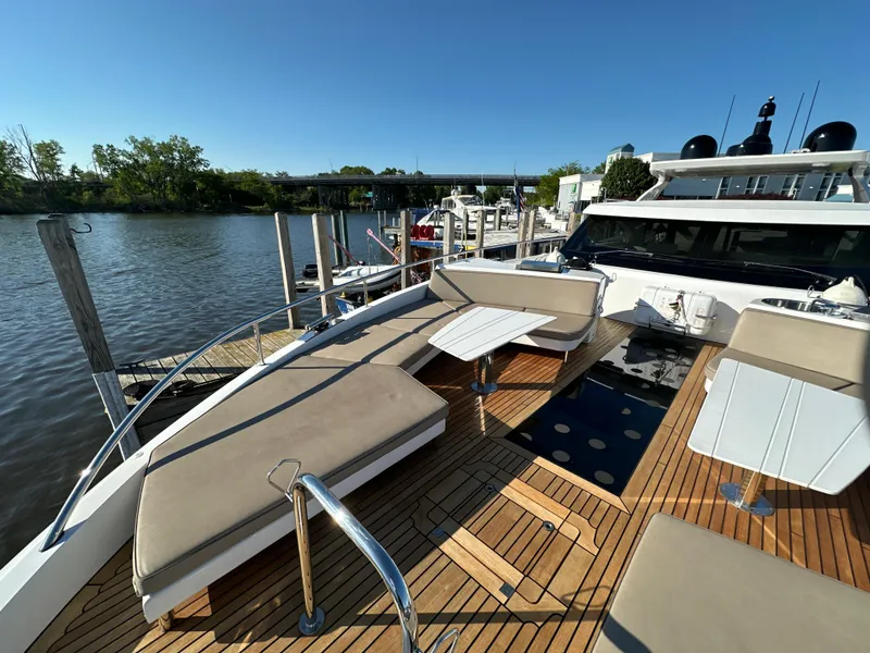 Slide: The Image of Van der Valk BeachClub 600 yacht, 2019 model, with spacious deck and seating by the water. - 40