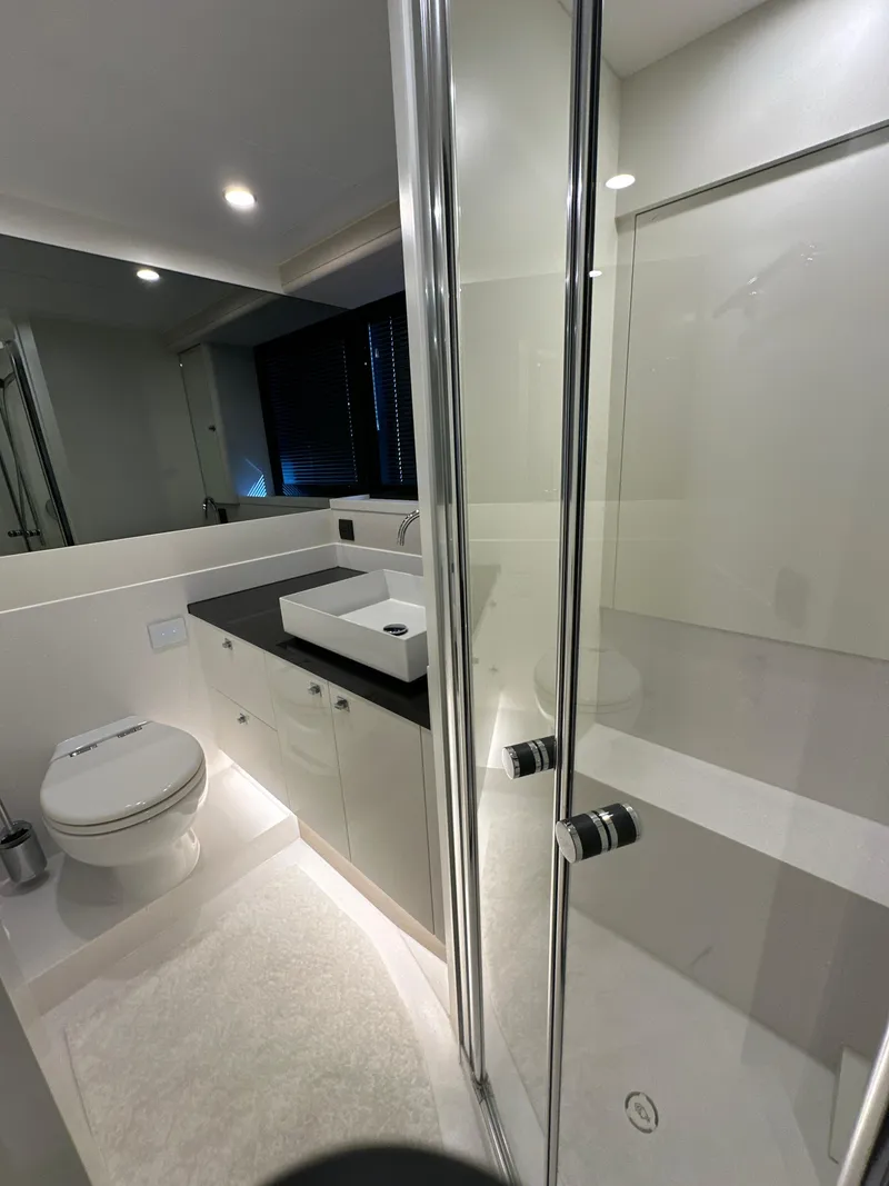 Slide: The Image of Modern bathroom in 2019 Van der Valk BeachClub 600 yacht, featuring sleek design and glass shower. - 9