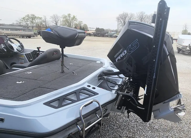 Slide: The Image of 2022 Ranger Z519 boat with powerful outboard motor, featuring spacious deck and seating. - 10