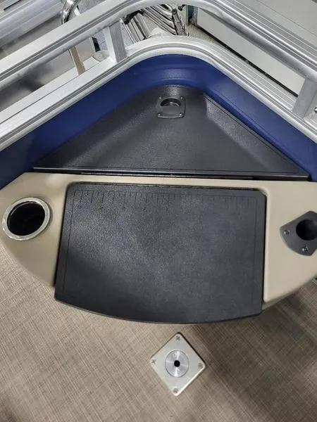 Slide: The Image of 2024 Sun Tracker Fishin Barge 20 DLX deck with cup holder and storage. - 10