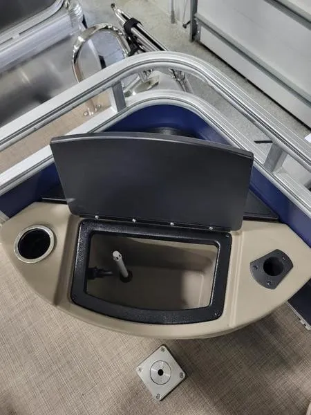 Slide: The Image of 2024 Sun Tracker Fishin Barge 20 DLX fishing station with storage compartment. - 9