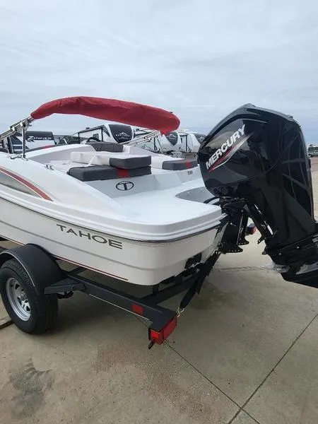 Slide: The Image of 2024 Tahoe T18 boat with Mercury outboard motor on trailer. - 3