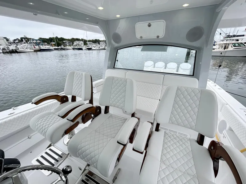 Slide: The Image of Luxurious 2025 HCB 48 Campeon boat interior with plush seating and elegant design. - 30