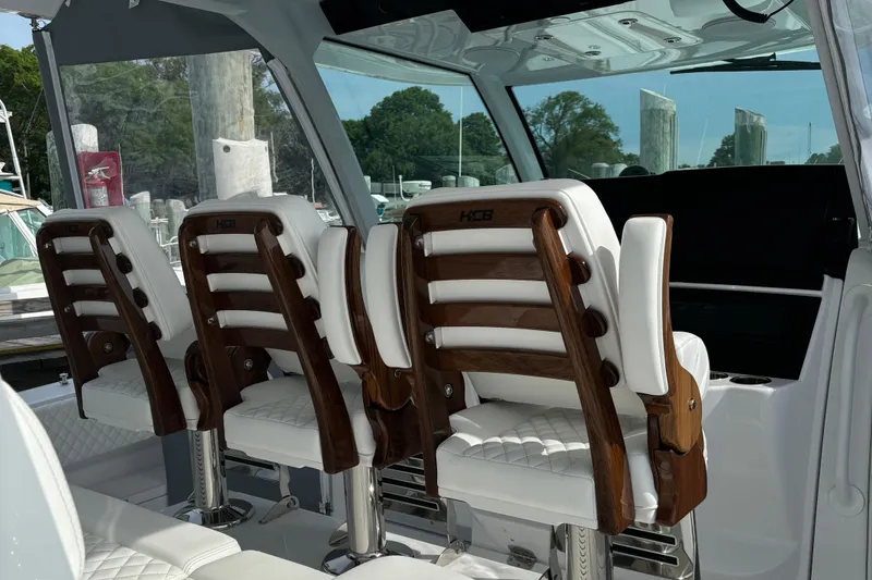 Slide: The Image of Interior of 2025 HCB 48 CAMPEON boat with luxurious seating. - 32