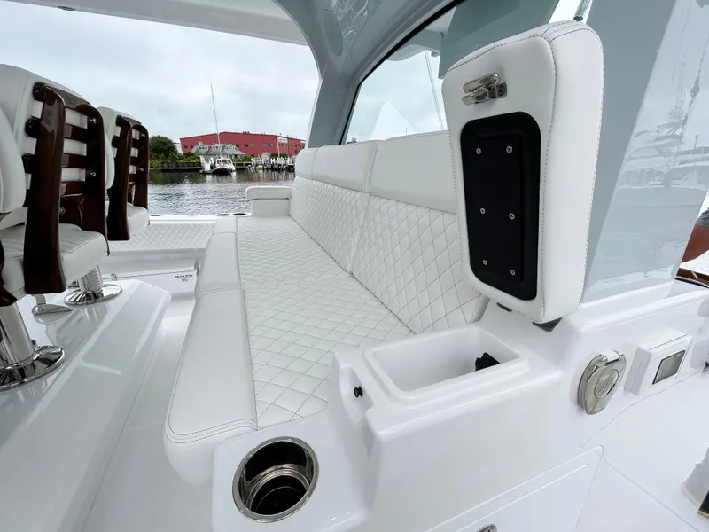 Slide: The Image of Luxurious seating on 2025 HCB 48 Campeon boat with quilted upholstery and sleek design. - 37