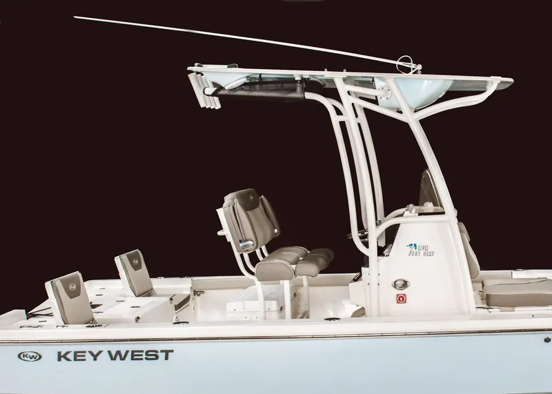 Slide: The Image of 2023 Key West 250 Bay Reef boat with T-top and seating. - 23