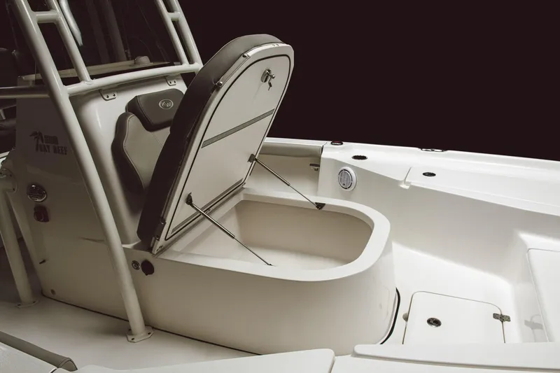 Slide: The Image of 2023 Key West 250 Bay Reef boat with open storage compartment. - 27