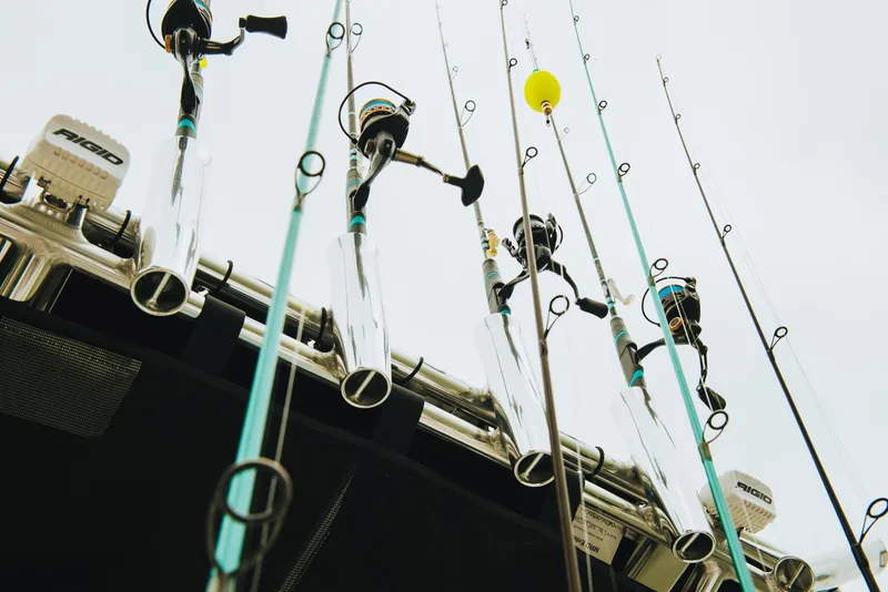 Slide: The Image of Fishing rods on a 2023 Key West 250 Bay Reef boat. - 41