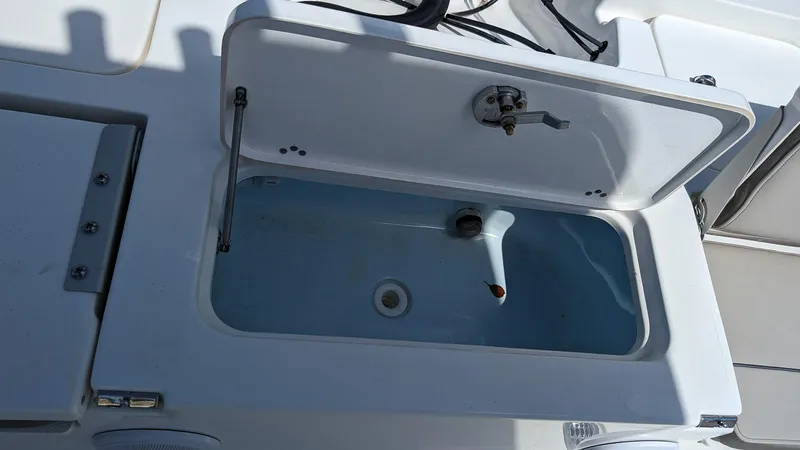 Slide: The Image of 2023 Key West 250 Bay Reef boat livewell compartment. - 8