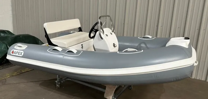 Slide: The Image of 2024 Apex A-10 Eurosport Rib Gallery inflatable boat in a warehouse setting. - 3
