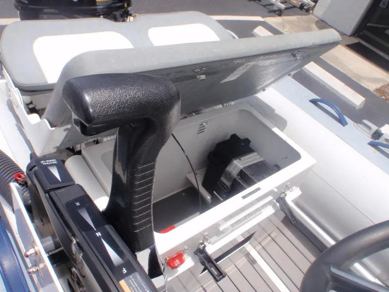 Slide: The Image of 2022 Highfield Classic 340 FCT boat interior storage compartment with open lid. - 14