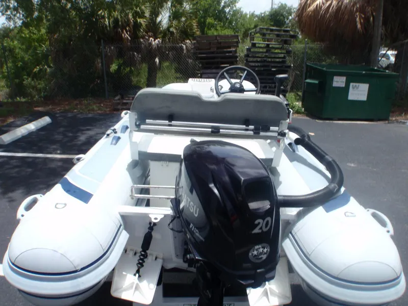 Slide: The Image of 2022 Highfield Classic 340 FCT inflatable boat with Tohatsu 20 HP outboard motor. - 3