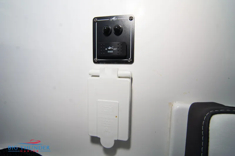 Slide: The Image of Control panel and outlet on a 2022 Monterey 378 SS boat. - 26