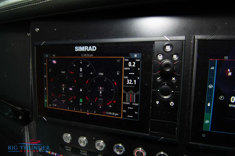 Slide: The Image of 2022 Monterey 378 SS dashboard with Simrad display. - 34