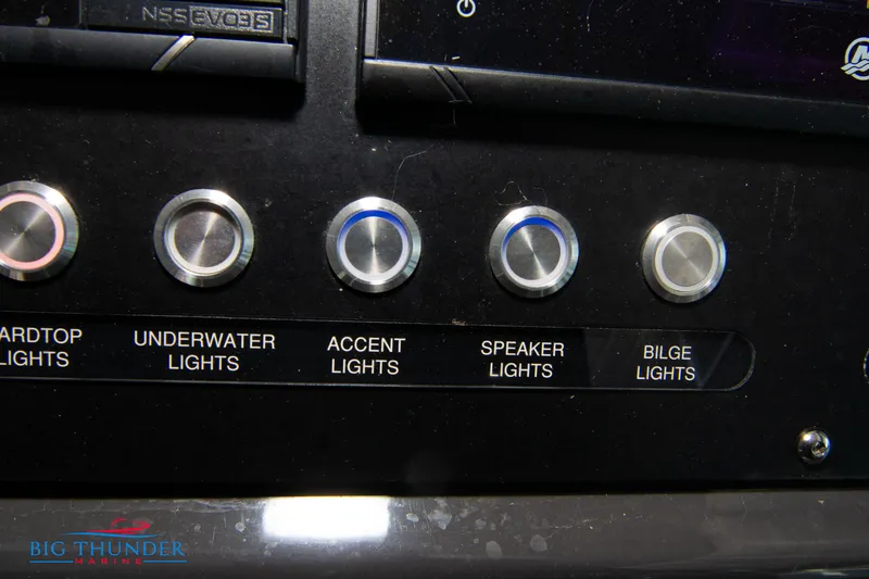 Slide: The Image of Control panel of 2022 Monterey 378 SS boat with light switches. - 39