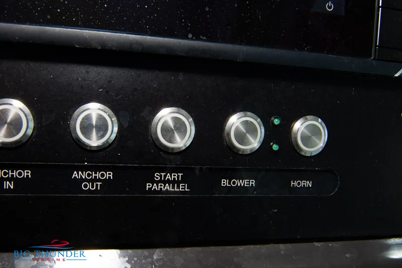 Slide: The Image of Control panel of a 2022 Monterey 378 SS boat with labeled buttons. - 41