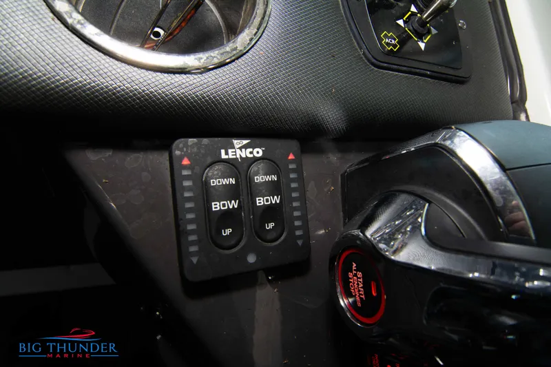Slide: The Image of Control panel of a 2022 Monterey 378 SS boat with Lenco trim tab switches. - 43