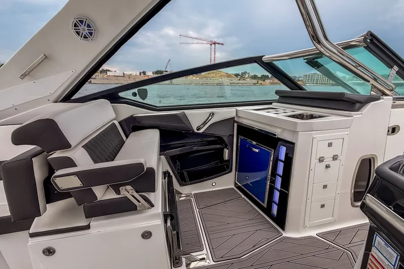 Slide: The Image of 2022 Monterey 378SS Super Sport boat interior with sleek seating and modern amenities. - 37