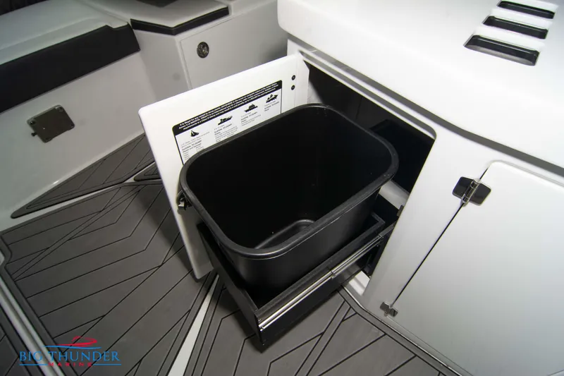 Slide: The Image of 2022 Monterey 378 SS boat with built-in trash bin compartment. - 24