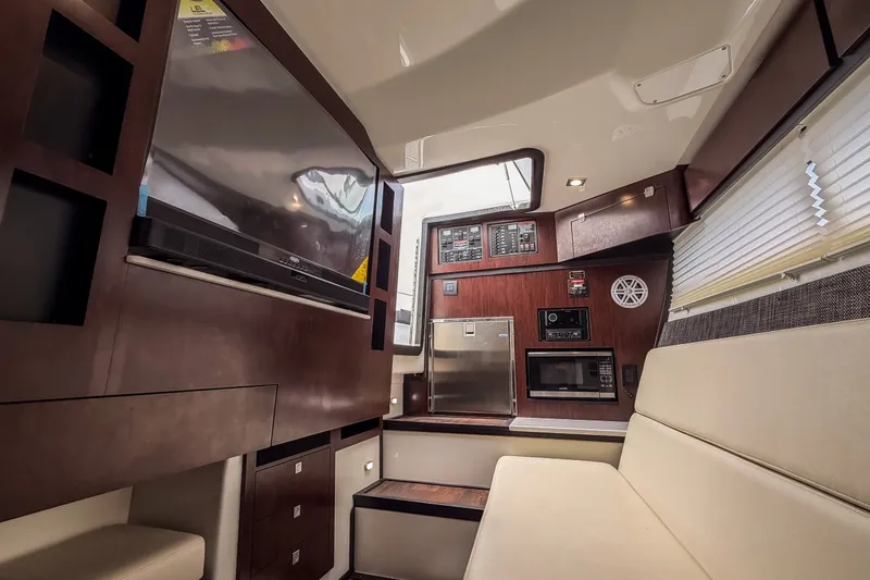Slide: The Image of Luxurious interior of 2022 Monterey 378SS Super Sport boat with modern amenities. - 32