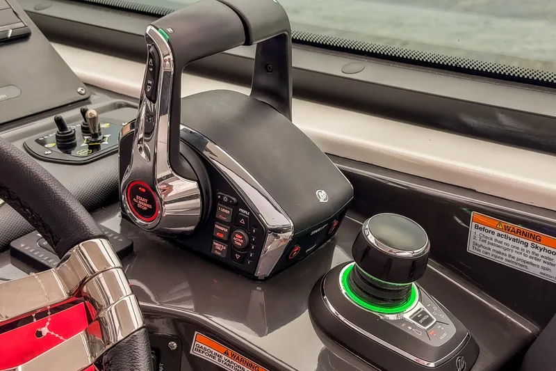 Slide: The Image of Control panel of 2022 Monterey 378SS Super Sport boat with joystick and throttle. - 14