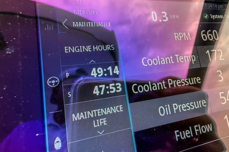 Slide: The Image of Dashboard display of a 2022 Monterey 378SS Super Sport showing engine hours and maintenance data. - 41