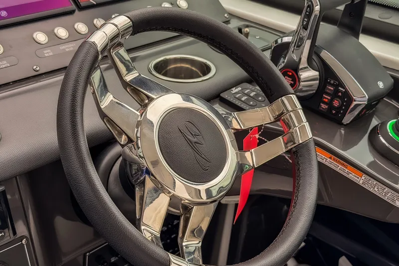 Slide: The Image of Steering wheel and controls of 2022 Monterey 378SS Super Sport boat cockpit. - 13