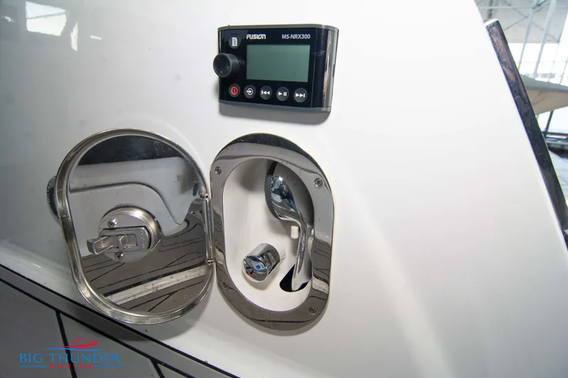 Slide: The Image of 2022 Monterey 378 SS boat control panel and fuel cap. - 15