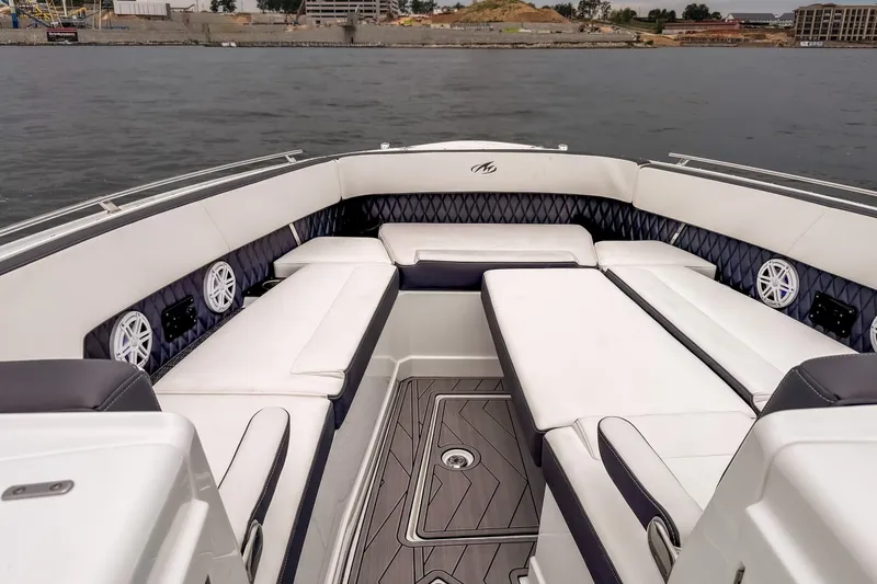 Slide: The Image of Luxurious seating area on a 2022 Monterey 378SS Super Sport boat, featuring elegant upholstery. - 22