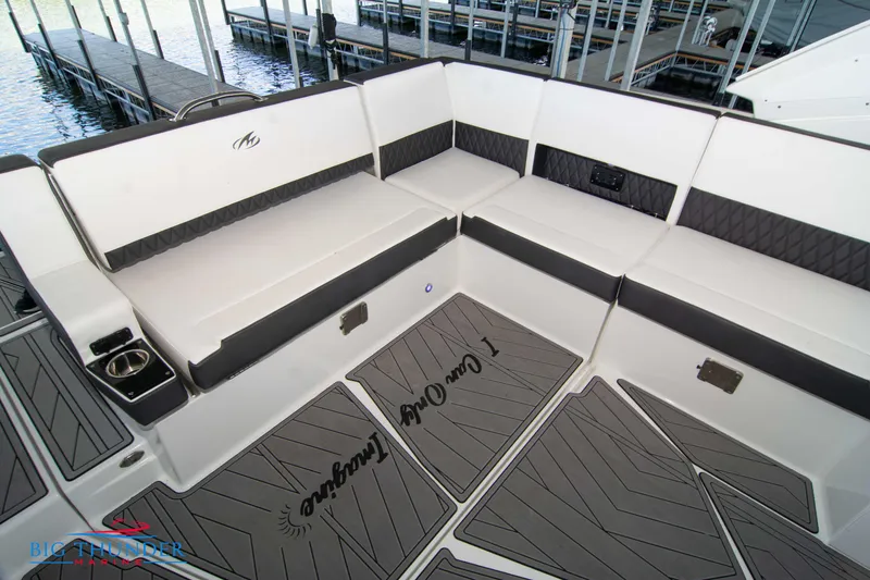 Slide: The Image of 2022 Monterey 378 SS boat interior with white and black seating - 20