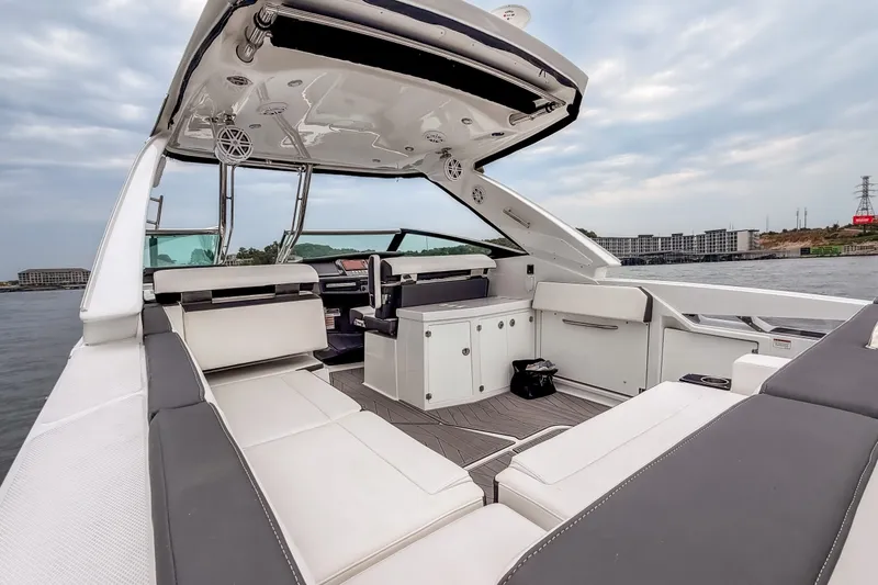 Slide: The Image of 2022 Monterey 378SS Super Sport boat interior with luxurious seating and modern design. - 11