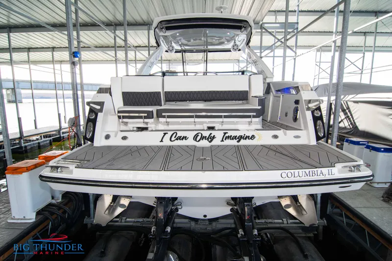 Slide: The Image of 2022 Monterey 378 SS boat docked, rear view, I Can Only Imagine text, Columbia, IL. - 4