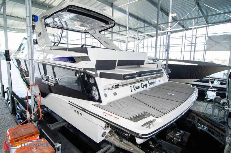 Slide: The Image of 2022 Monterey 378 SS boat docked in a marina. - 3