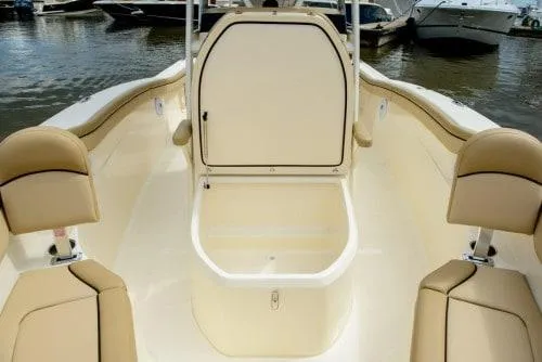 Slide: The Image of 2024 Scout 215XSF boat interior with open storage compartment. - 8
