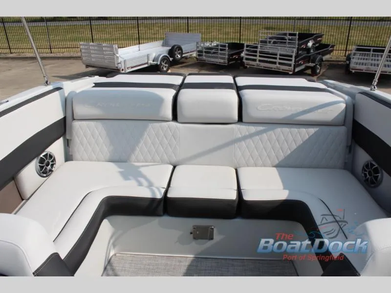 Slide: The Image of 2023 Crownline 240 SS boat interior with white and black seating. - 14