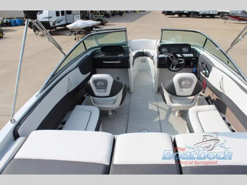 Slide: The Image of 2023 Crownline 240 SS boat interior with seating and dashboard at The Boat Dock. - 3
