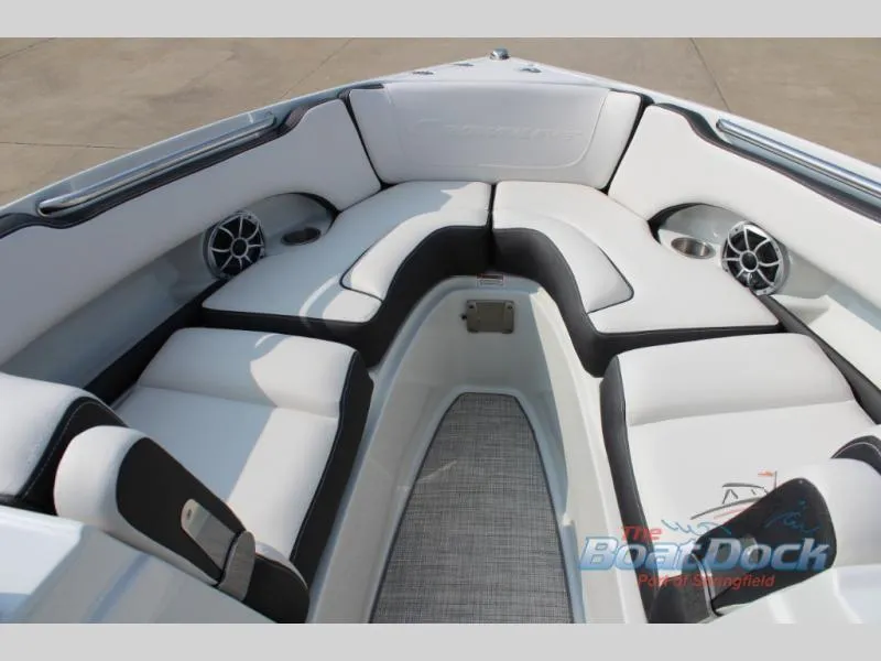 Slide: The Image of 2023 Crownline 240 SS boat interior with white and black seating. - 5